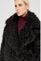 Double-sided curly sheepskin coat in dark chocolate color made of natural sheepskin in OVERSIZE style